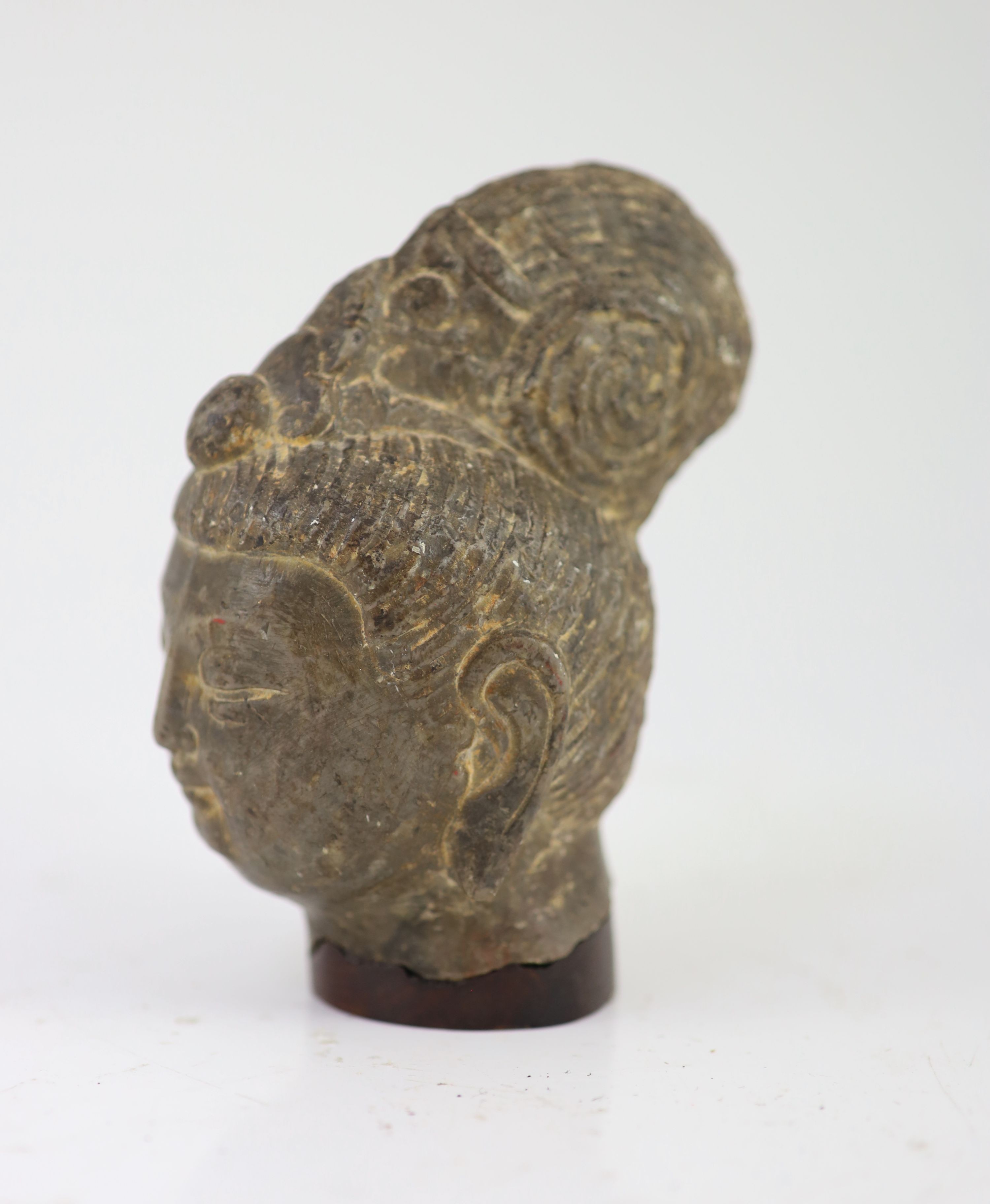 A Chinese grey marble head of Guanyin, Ming dynasty or earlier, 16cm high